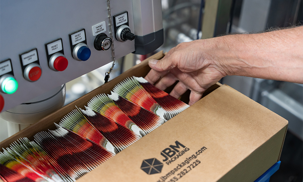 Seed contract packiging organized in a box and being quality checked before shipment.