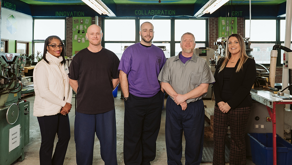 JBM team members with inmates at London Correctional Instiution.