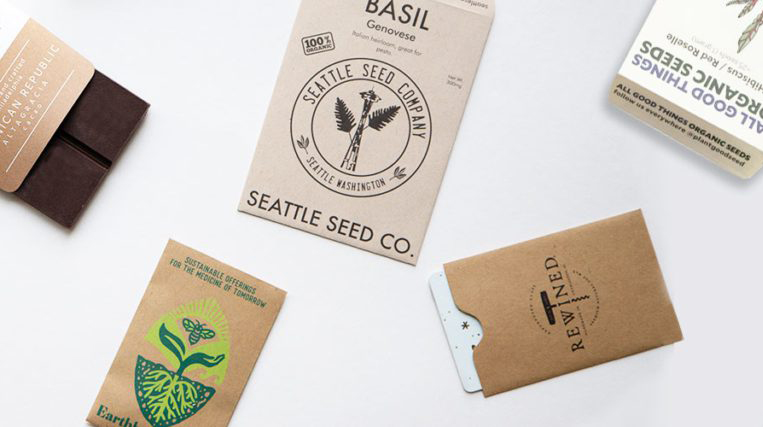 A variety of biodegradable paper packaging, including for seeds and chocolate bars.